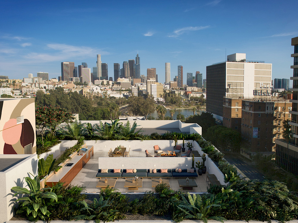 Apartments in Westlake, CA - Wilco Apartments Aerial View of Rooftop Lounge with Lush Greenery, Grilling Area, and Skyline Views